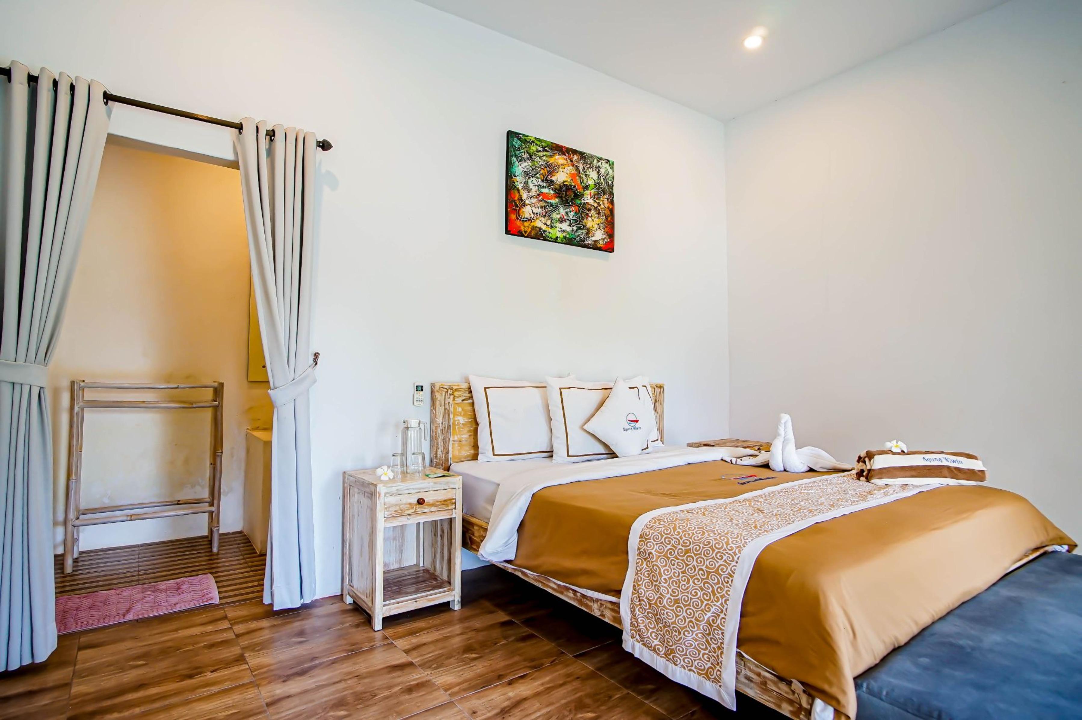 Agung Wiwin Homestay & Restaurant Mengwi ภายนอก รูปภาพ