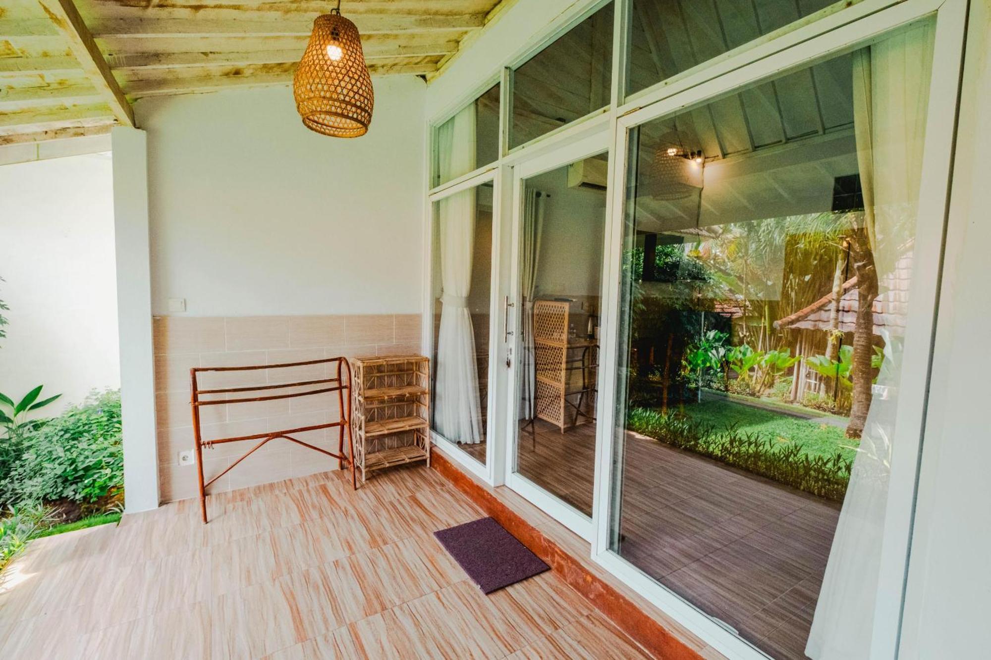 Agung Wiwin Homestay & Restaurant Mengwi ภายนอก รูปภาพ