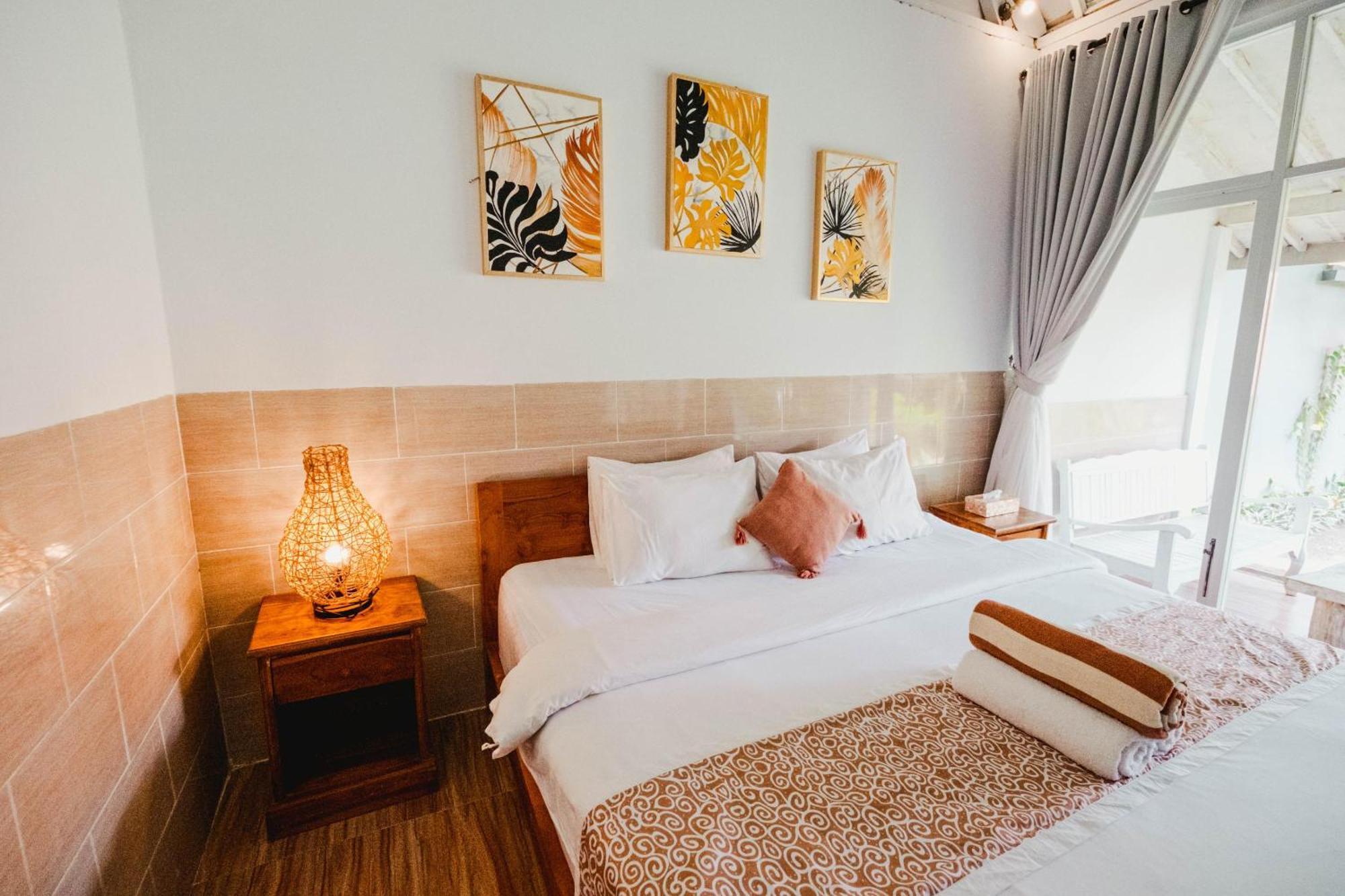 Agung Wiwin Homestay & Restaurant Mengwi ภายนอก รูปภาพ