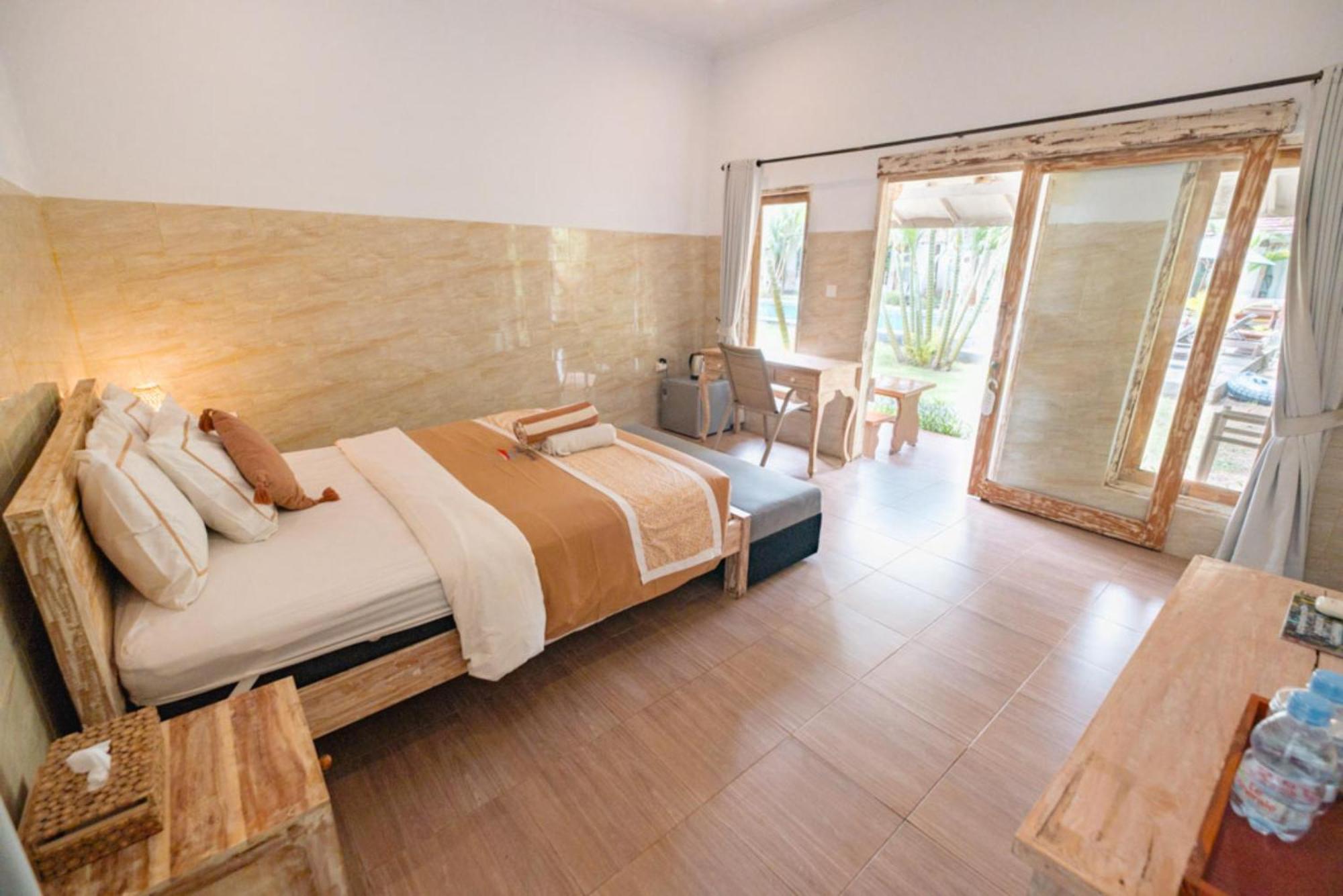 Agung Wiwin Homestay & Restaurant Mengwi ภายนอก รูปภาพ